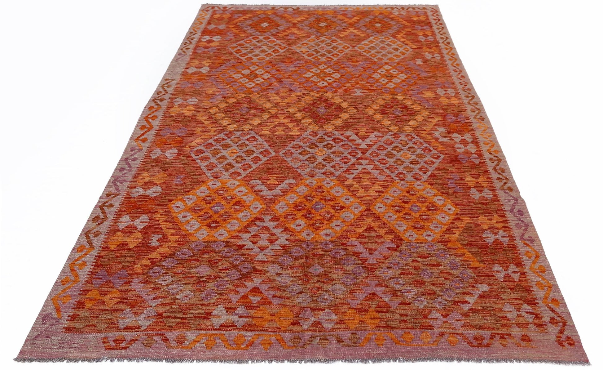 Handwoven Afghan Maimana kilim rug featuring a geometric diamond pattern in orange and purple tones.
