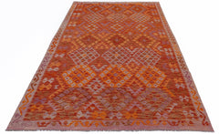 Handwoven Afghan Maimana kilim rug featuring a geometric diamond pattern in orange and purple tones.