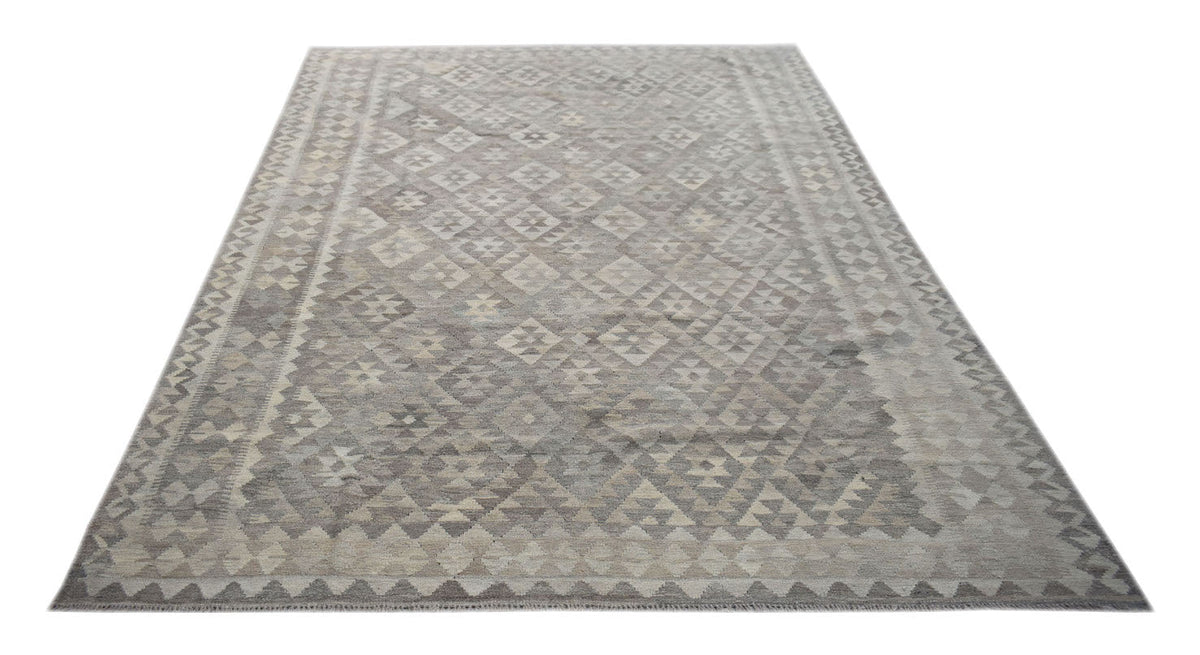 Handwoven Afghan Maimana kilim rug featuring a neutral geometric pattern in shades of grey.
