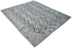 A handmade Afghan Maimana kilim rug featuring a geometric diamond pattern in shades of blue and grey.