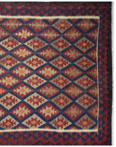 Handmade Afghan Maimana kilim rug featuring a repeating geometric diamond pattern in warm tones.
