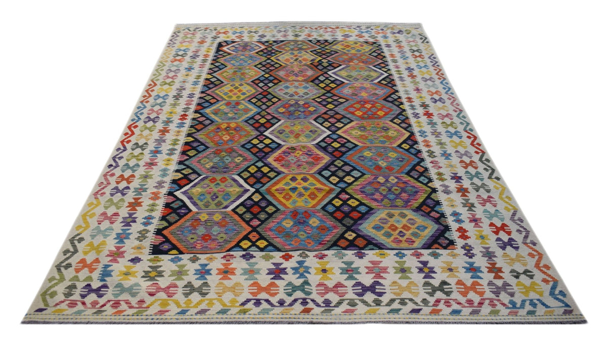 Handwoven Afghan Maimana kilim rug featuring a colorful geometric diamond pattern on a wool base.