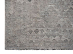 Handwoven Afghan Maimana kilim rug featuring a neutral grey geometric pattern in natural wool.