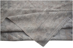 A handwoven Afghan Maiamana kilim featuring a neutral, undyed wool pattern with a flat texture.