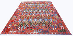 Handwoven Afghan Maimana Kilim rug featuring a vibrant, multi-colored geometric diamond pattern.