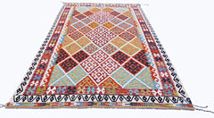 Handwoven Afghan Maimana kilim rug featuring a colorful geometric diamond pattern.