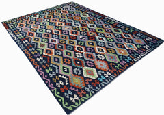 A handmade Afghan Maimana kilim rug featuring a vibrant, multi-colored geometric diamond pattern.