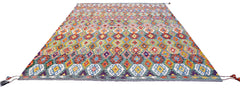 Handwoven Afghan Maimana kilim rug featuring a colorful geometric diamond pattern in wool.