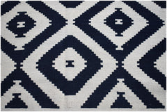 Afghan Maimana Kilim with a geometric diamond pattern in navy and cream.