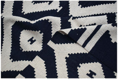 Afghan Maimana Kilim with a geometric pattern in navy and cream.