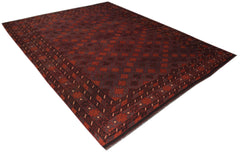 A handmade Afghan Maimana kilim rug featuring a geometric pattern in shades of red and brown.