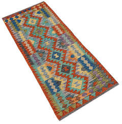 Afghan Maimana Kilim runner with geometric patterns in multiple colors.