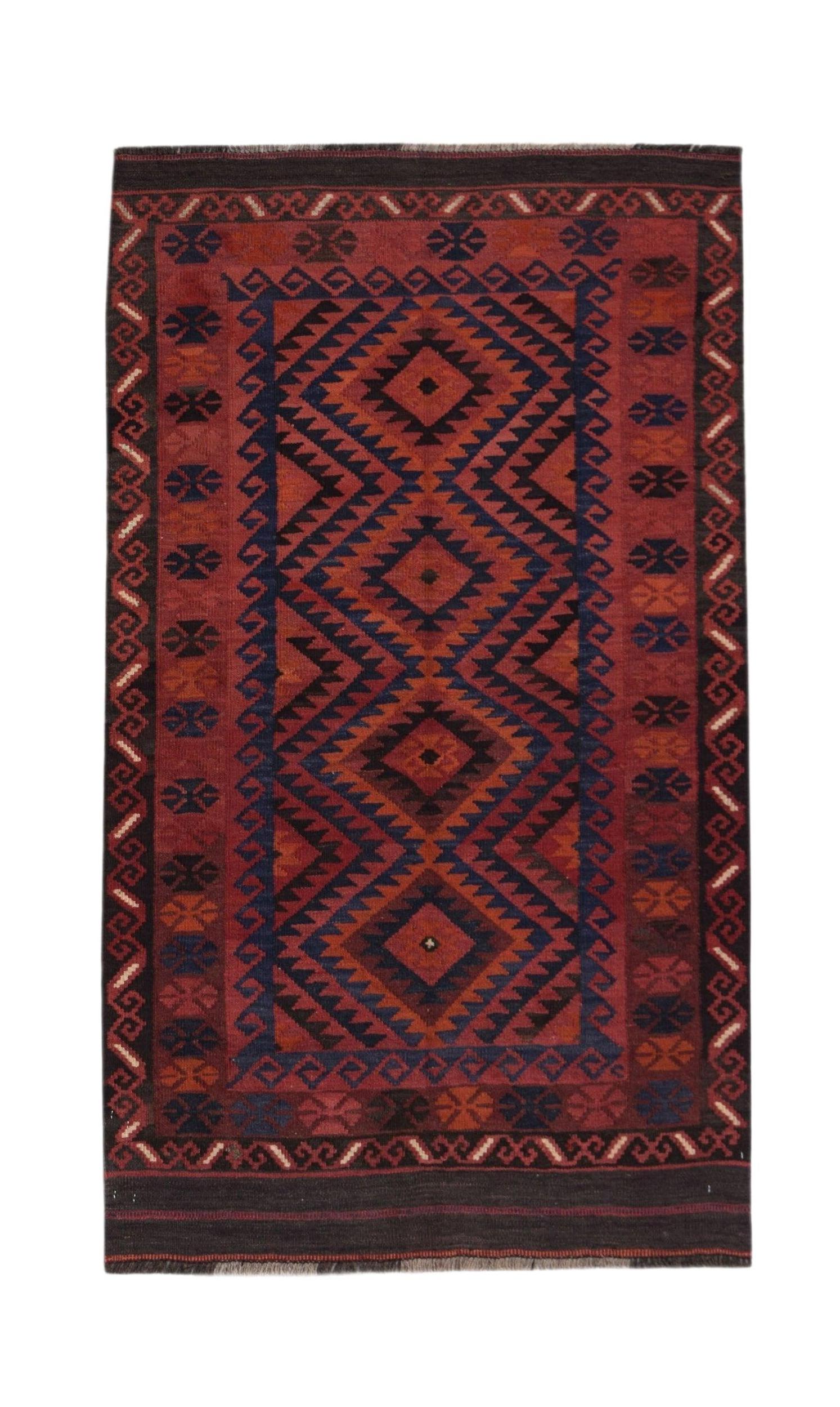 Handwoven Afghan Maimana wool runner featuring a geometric diamond pattern in red and blue tones.