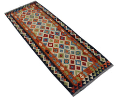 Handwoven Afghan Maimana wool runner featuring a colorful geometric diamond pattern.