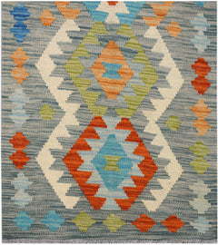 Handwoven Afghan Maimana kilim runner featuring a geometric pattern in blue, orange, and green.