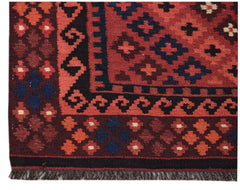 Handwoven Afghan Maimana kilim runner featuring a geometric pattern in red, black, and blue wool.