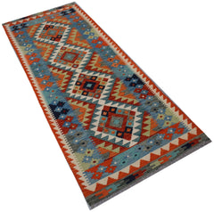 Handmade Afghan Maimana wool runner rug featuring a colorful geometric diamond pattern.