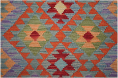 Handmade Afghan Maimana kilim runner featuring a vibrant geometric diamond pattern in wool.