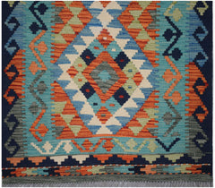 Handwoven Afghan Maimana wool runner featuring a vibrant geometric diamond pattern.