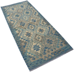 An Afghan Maimana Kilim runner featuring a geometric diamond pattern in shades of blue and beige.