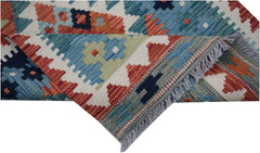 Handwoven Afghan Maimana wool runner featuring a geometric pattern in blue, orange, and cream.