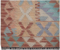 Handmade Afghan Maimana kilim runner featuring a geometric pattern in muted earth tones.