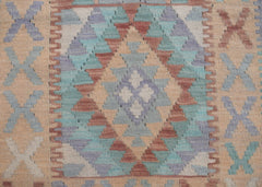 Handmade Afghan Maimana kilim runner featuring a geometric diamond pattern in muted earth tones.