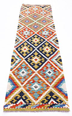Handwoven Afghan Maimana wool runner featuring a colorful geometric diamond pattern.