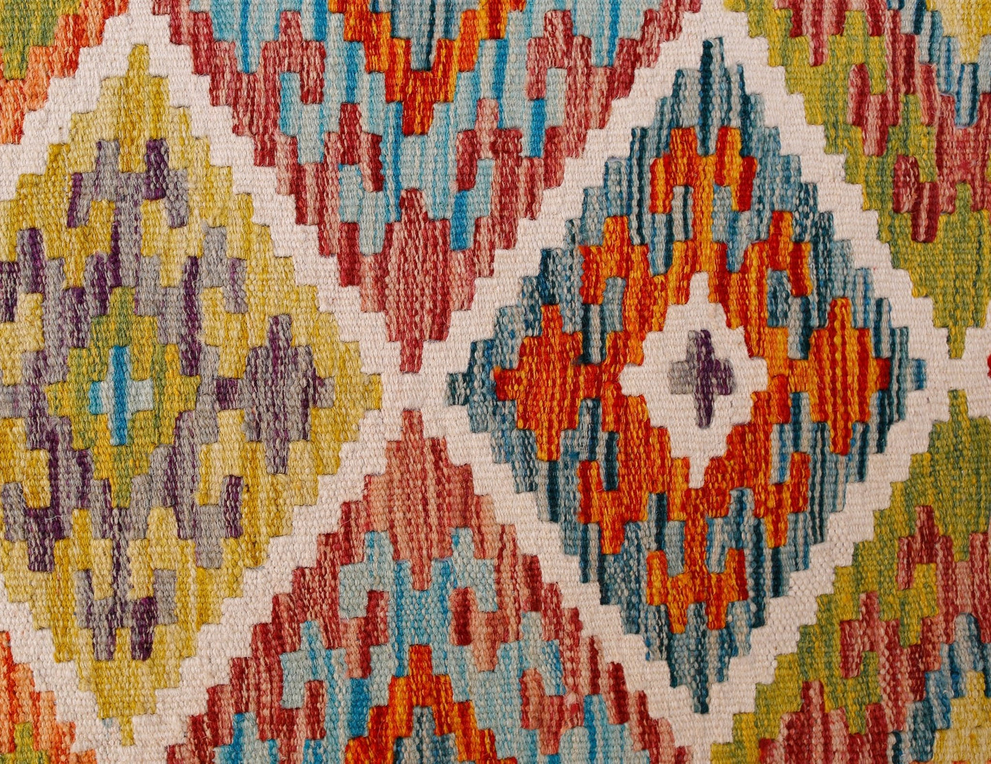 Handwoven Afghan Maimana wool kilim runner featuring a vibrant geometric diamond pattern.
