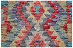 Handwoven Afghan Maimana wool runner featuring a colorful geometric diamond pattern.