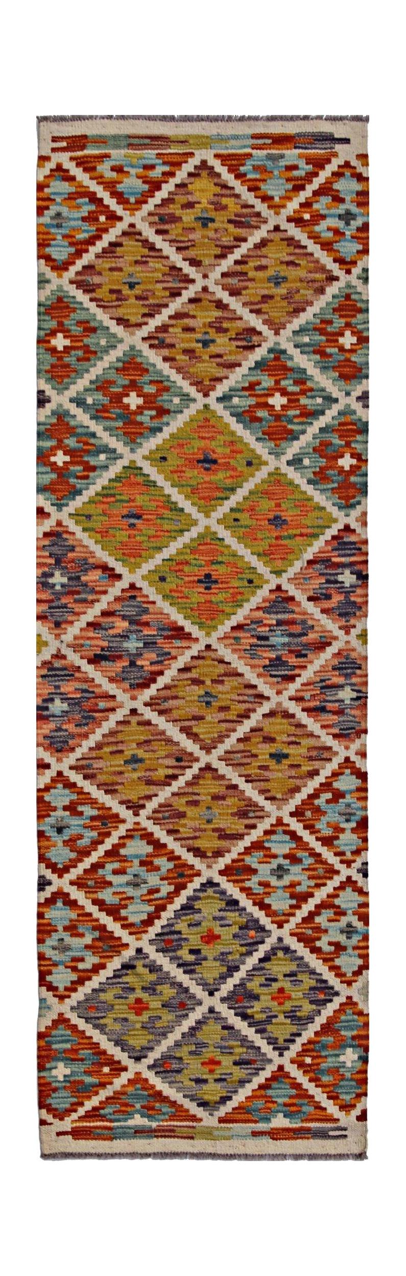 Handwoven Afghan Maimana wool runner rug featuring a colorful geometric diamond pattern.