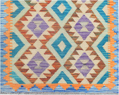 Handmade Afghan Maimana kilim runner featuring a geometric diamond pattern in blue, purple, and orange.