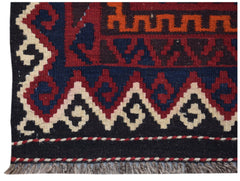 Handwoven Afghan Maimana kilim runner featuring geometric patterns in red, blue, and cream wool.