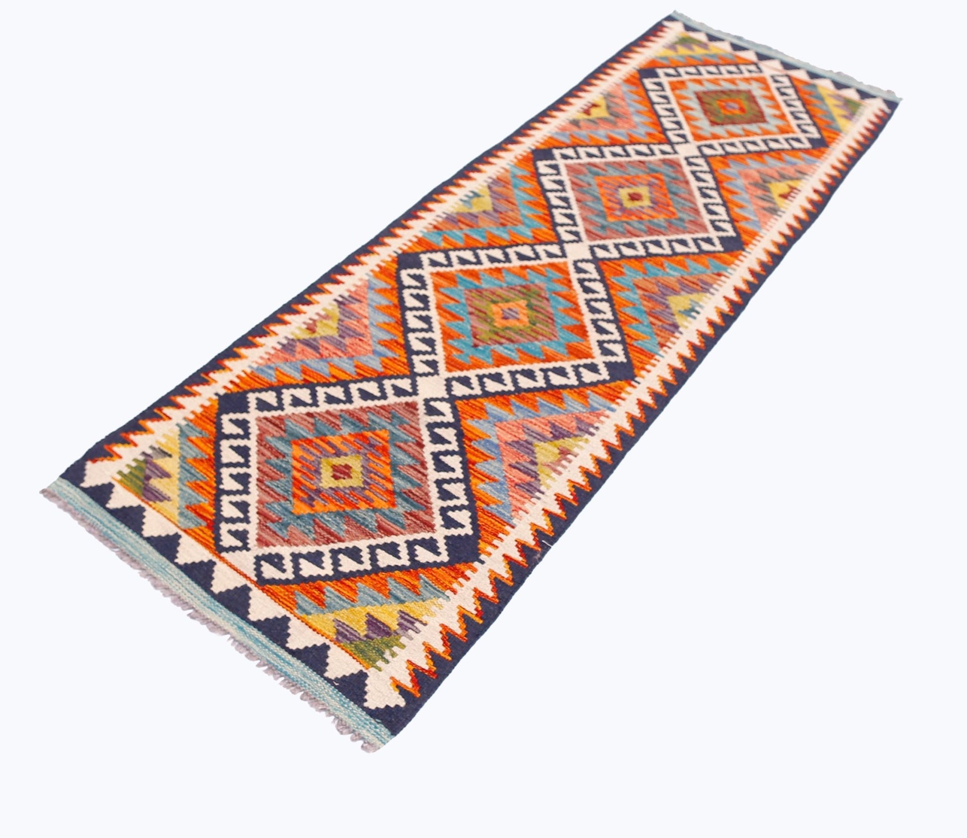 A handmade Afghan Maimana wool runner rug featuring a vibrant geometric diamond pattern.