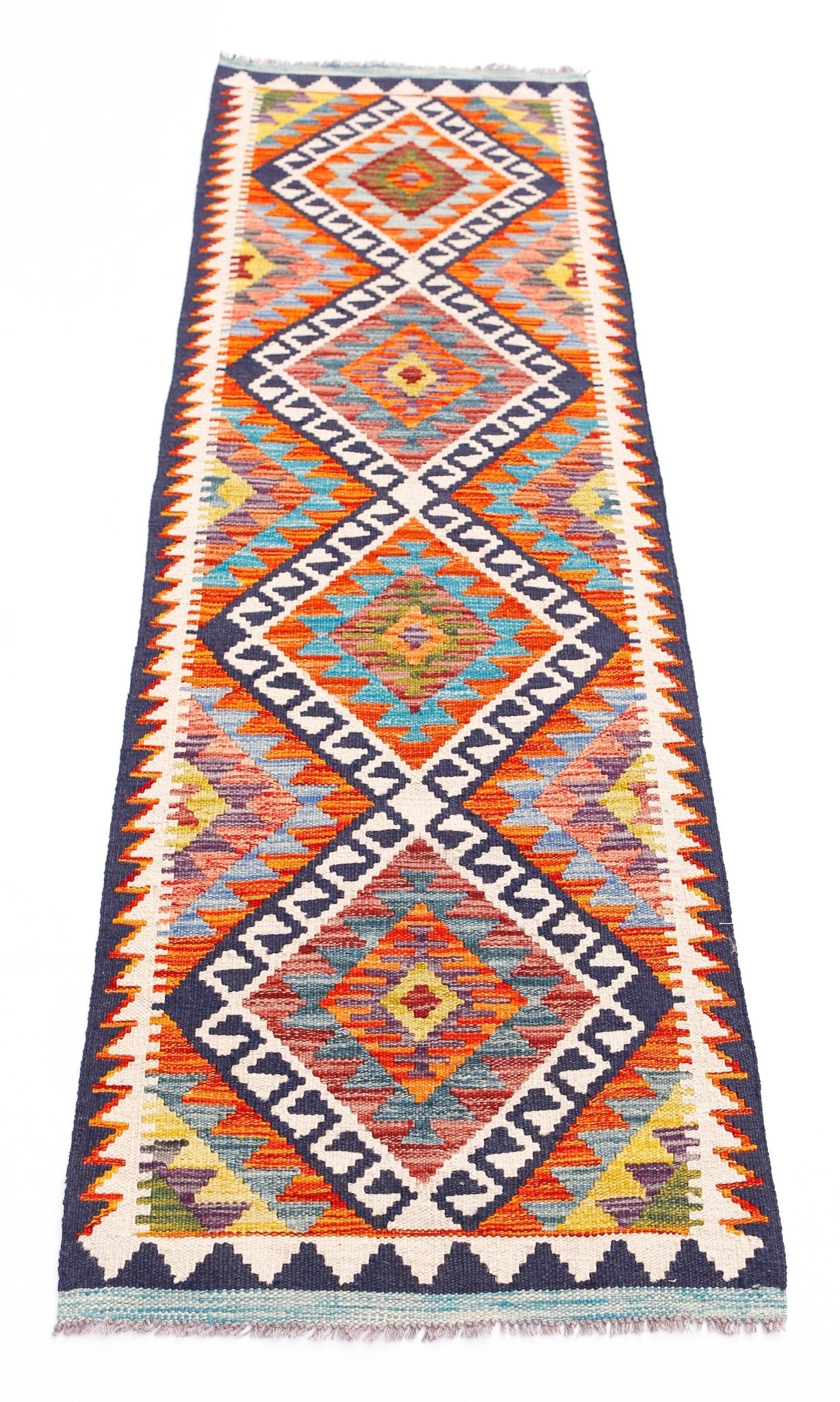 Handwoven Afghan Maimana wool runner featuring a vibrant geometric diamond pattern.