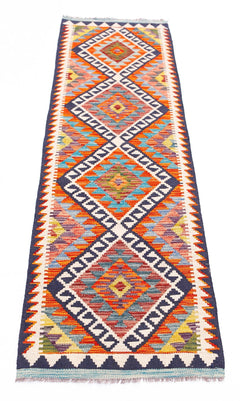 Handwoven Afghan Maimana wool runner featuring a vibrant geometric diamond pattern.