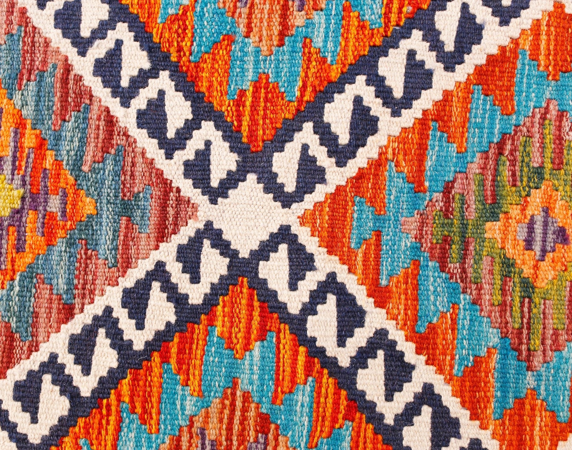 Handwoven Afghan Maimana wool kilim runner featuring a vibrant geometric pattern.