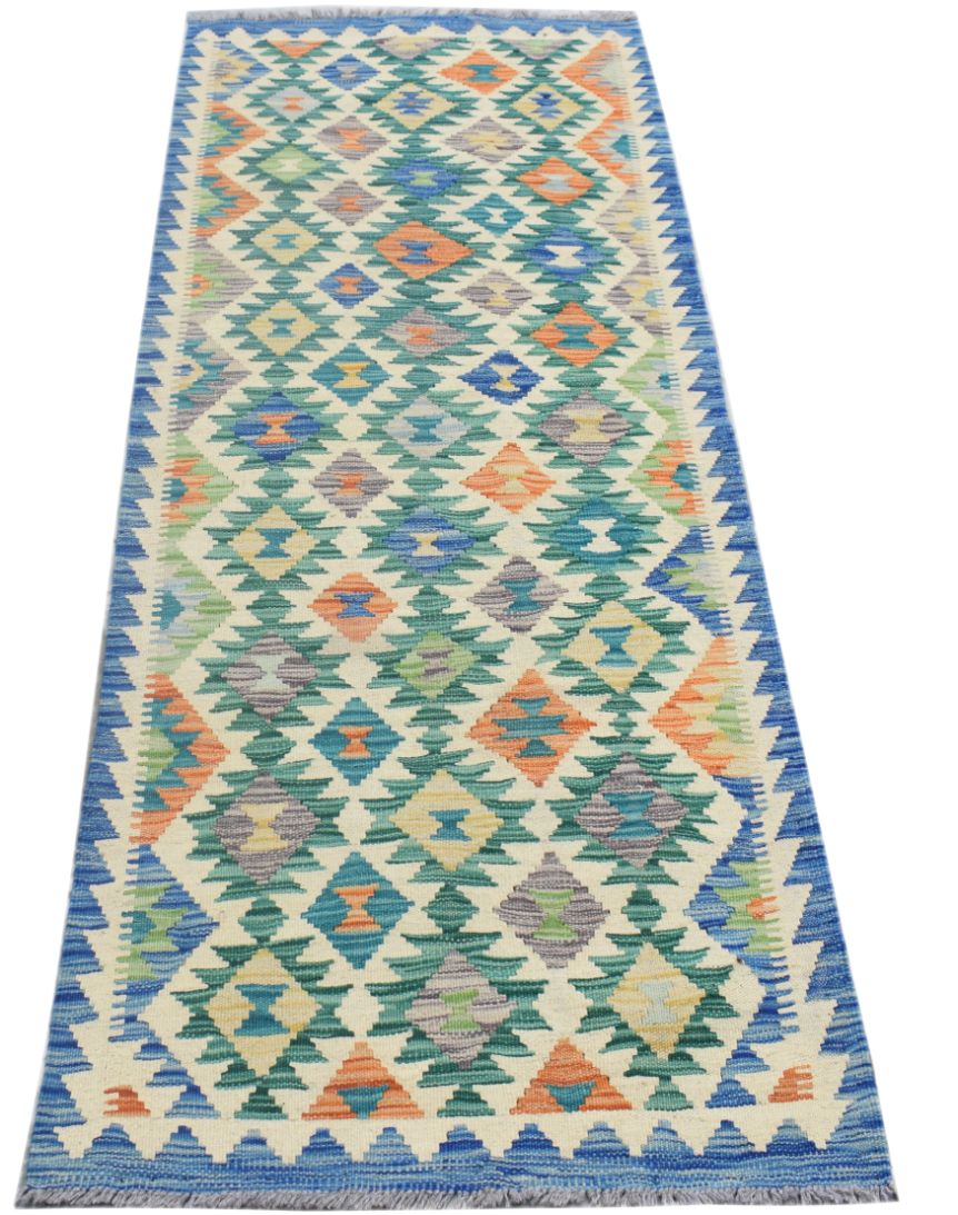 Handmade Afghan Maimana wool runner rug featuring a colorful geometric diamond pattern.