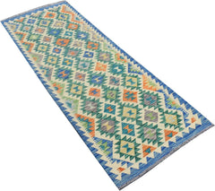Handmade Afghan Maimana wool runner rug featuring a colorful geometric diamond pattern.