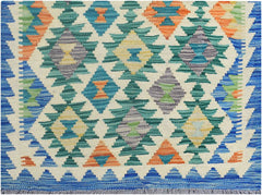 Handmade Afghan Maimana kilim runner featuring a colorful geometric diamond pattern on a cream base.
