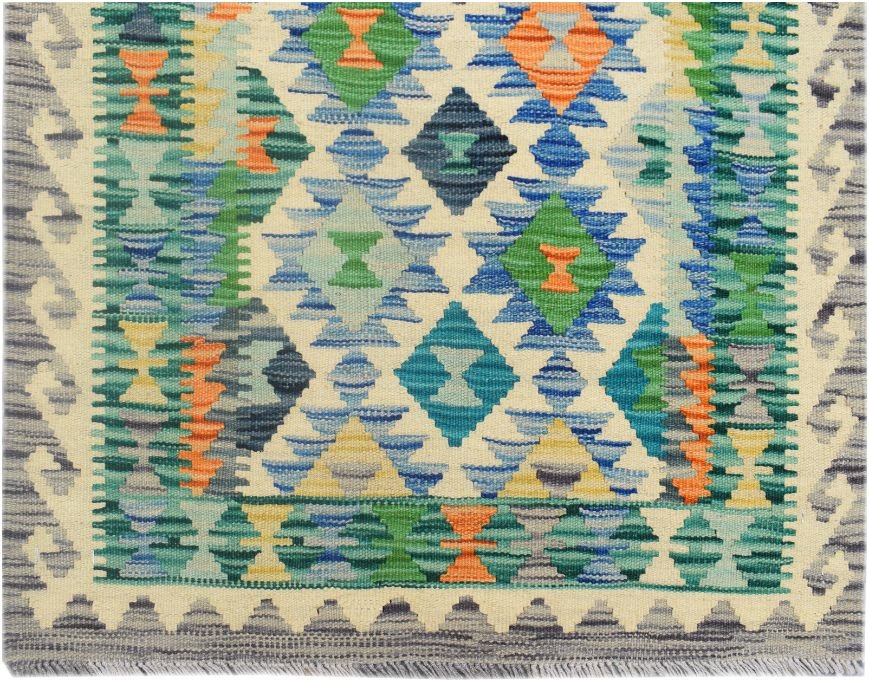 Handmade Afghan Maimana wool runner rug featuring a colorful geometric diamond pattern.