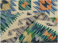 A handmade Afghan Maimana kilim runner featuring a geometric pattern in vibrant, multicolored wool.