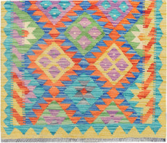 Handmade Afghan Maimana kilim runner featuring a vibrant geometric diamond pattern in wool.