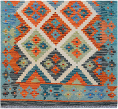 Handwoven Afghan Maimana kilim runner featuring a geometric diamond pattern in vibrant colors.