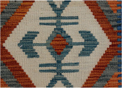 Handwoven Afghan Maimana kilim runner featuring a geometric blue and orange diamond pattern.