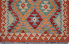 Handmade Afghan Maimana kilim runner featuring a geometric pattern in vibrant orange and blue tones.