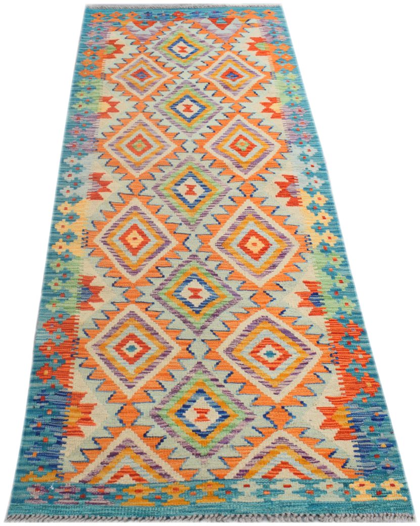 Handmade Afghan Maimana wool runner rug featuring a vibrant geometric diamond pattern.