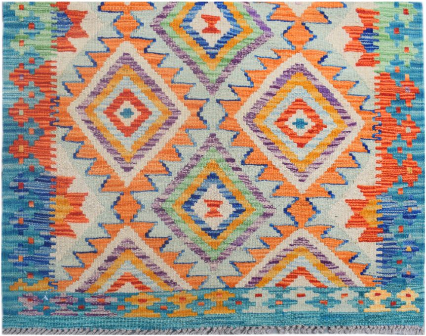 Handmade Afghan Maimana kilim runner featuring a vibrant geometric diamond pattern in wool.