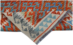 Handwoven Afghan Maimana wool runner featuring a geometric pattern in orange, blue, and grey.