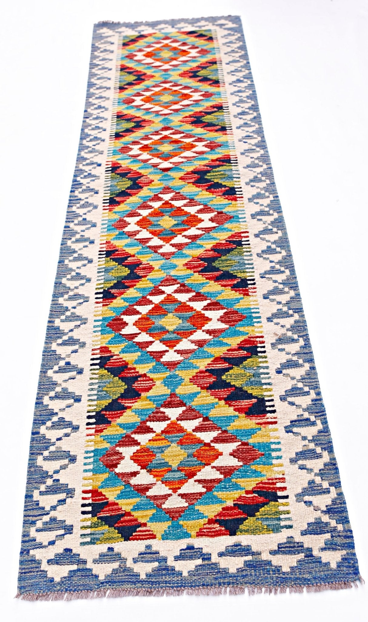 Handwoven Afghan Maimana wool runner featuring a colorful geometric diamond pattern.